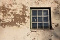 Old broken window to barn in stone and concrete Royalty Free Stock Photo