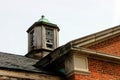 Old broken windows on abandoned brick asylum building Royalty Free Stock Photo