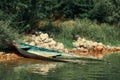 Old broken wooden boat drowned under water close to the coast