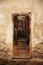 Old Broken Wooden Brown Door With Handle High Over Ground