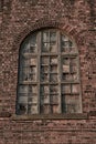 Old broken wooden windowpanes with wall detail