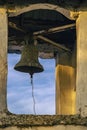 old bronze bell tower old christian church Against Blue Sky Royalty Free Stock Photo