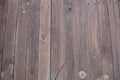 Old brown barn wood parquet background texture with scratches and cracks close up Royalty Free Stock Photo