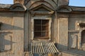 Old brown concrete loft with a window with rusty iron Royalty Free Stock Photo