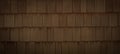 Old brown dark rustic wooden shingles wall texture - wood background panorama banner Royalty Free Stock Photo