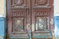 Old brown doors in the wall Royalty Free Stock Photo