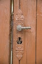 Old brown lock on garden door Royalty Free Stock Photo