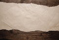 Old brown paper on wood Royalty Free Stock Photo