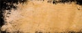 Old brown parchment paper background with yellowed vintage grunge texture borders and off white light center with distressed faded Royalty Free Stock Photo