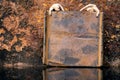 Old brown sign on rusty background