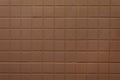 Old brown tile wall background Royalty Free Stock Photo