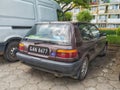 Old brown Toyota Corolla private car two doors parked Royalty Free Stock Photo