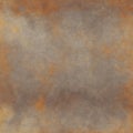 Old brown vignette with orange framed stains and central torn distressed empty Royalty Free Stock Photo