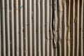 Old brown wavy metal plate wall