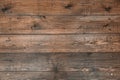 Old brown wooden background with nails made of dark natural wood in the style of grunge. Top view. Natural raw planed texture of Royalty Free Stock Photo