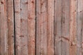 Old brown wooden wall, detailed background photo texture. Wood plank fence close up Royalty Free Stock Photo