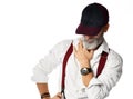 Old brutal senior millionaire man in white shirt and cap stylish fashionable men
