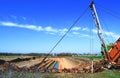 Old bucket excavator of transverse dripping conducts