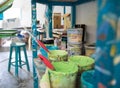 Old colorful paint buckets