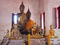 Old Buddha statue with disciple in old temple Thailand Royalty Free Stock Photo