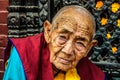 Old buddhist nun in Kathmandu, Nepal Royalty Free Stock Photo