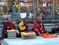 Old buddhistic monks are praying