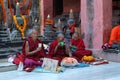 Old buddhistic monks are praying at Kagyu Monlam