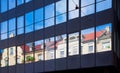 Old building architecture reflected in modern building Royalty Free Stock Photo