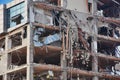 Old building being demolished to make room for new architecture. Construction Demolition Site. Royalty Free Stock Photo