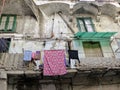 Old building of a courtyard in the historical center of Salerno in Italy.