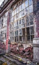 Old building with damaged windows concept photo. European towers.