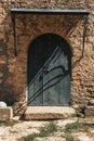 Old building. Door and windows in an old building. Lattices on windows