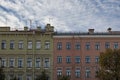 Old building facades and window on a blue sky Royalty Free Stock Photo