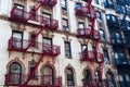 Old building with fire escape stairs in Soho, NYC Royalty Free Stock Photo