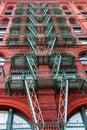 Old building with fire escape stairs in Soho, NYC Royalty Free Stock Photo