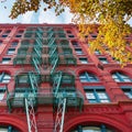 Old building with fire escape stairs in Soho, NYC Royalty Free Stock Photo