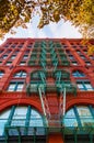 Old building with fire escape stairs in Soho, NYC Royalty Free Stock Photo