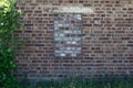 An old building in the forest with bricked up windows Royalty Free Stock Photo