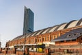 Old building of G-Mex with metrolink tram in foreground. Royalty Free Stock Photo