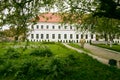 Old building with garden and green alley at the Dubno Castle in Ukraine, Rivne region