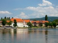 old building with lake reflection