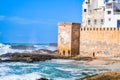 Old building near sea shore with plain blue sky in Venice Italy