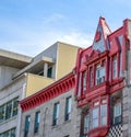 The old building with red roof on the little street i