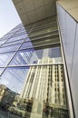 Old building reflected modern building windows Royalty Free Stock Photo