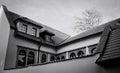 Old building with a series of windows and a tiled roof Prague, Czech Republic Royalty Free Stock Photo