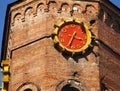 Old building tower with red clock in Ukraine Vinnitsa