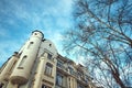 Old building trees and sky in Moscow