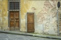 Old building on an uphill street in Florence, Italy