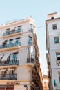 Old building wall in the streets of the city of Valencia. Windows and balconies. Spain. Royalty Free Stock Photo