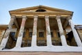 old building with wooden carved columns. A forgotten winter view Royalty Free Stock Photo